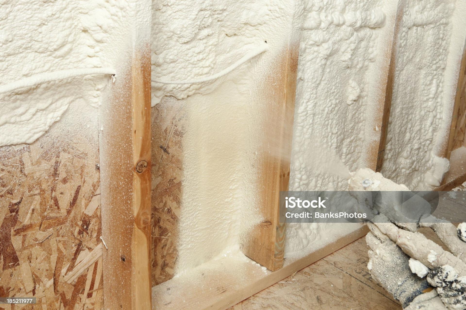 Spray foam applied to wall cavities